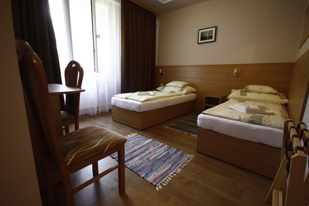 Parti Panzio Hotel Tata Buitenkant foto